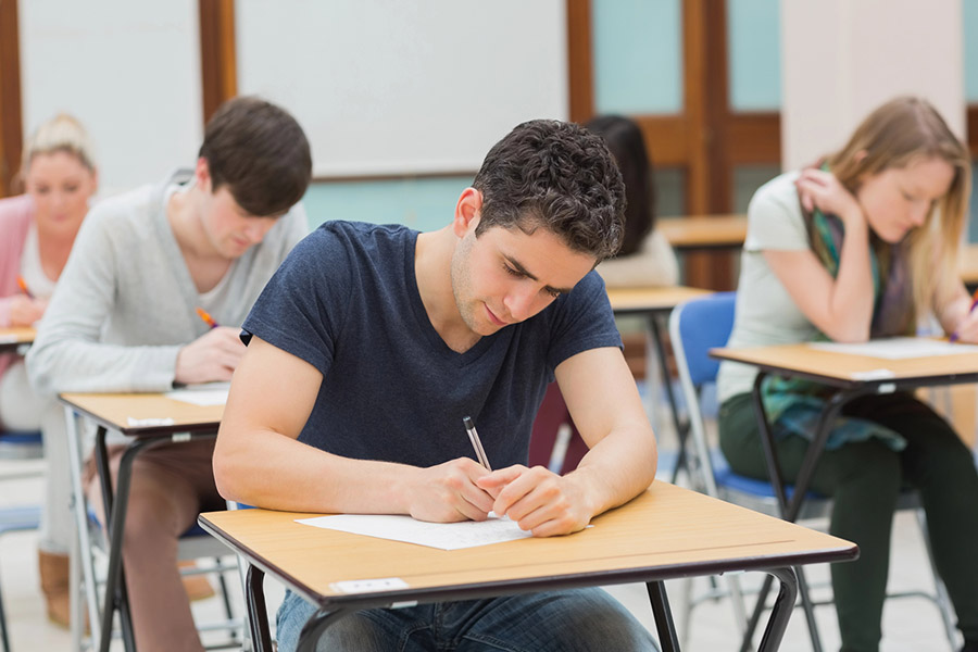 Students taking a test in a classroom in Houston